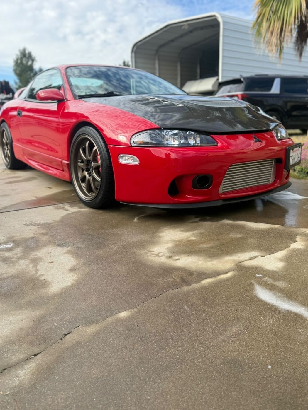 Mitsubishi Eclipse in bright red, glossy paint