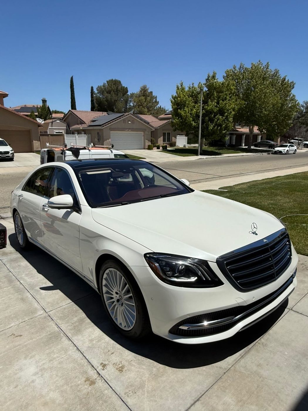 Mercedes-Benz S-Class in pearl white, showroom ready