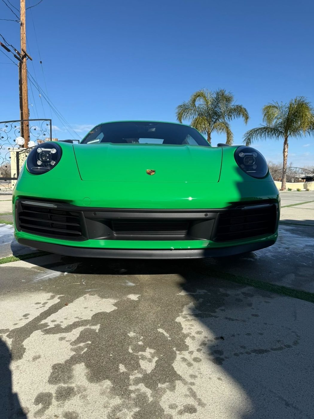 Porsche 911 in signature green, freshly detailed